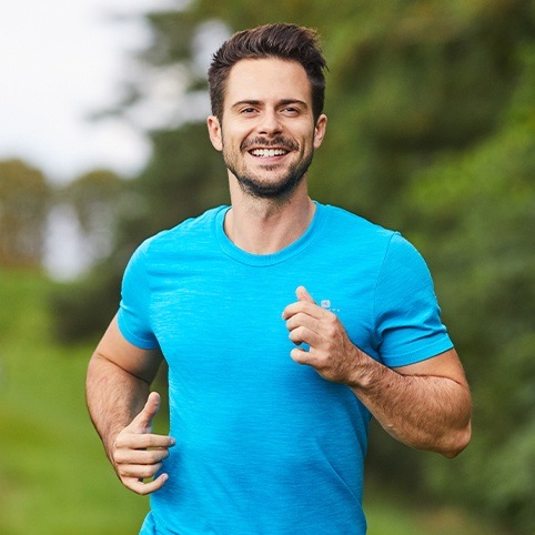 Man jogging after treatment for hip injury