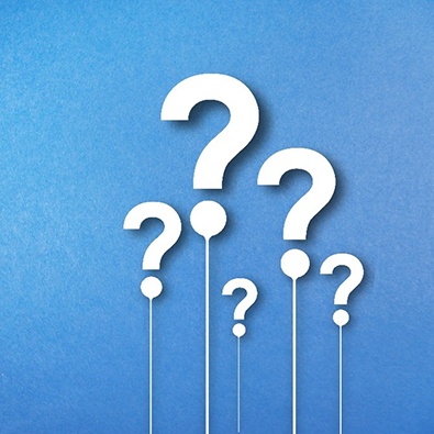 blue graphic featuring question marks 